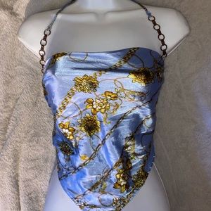 J for Justify blue top